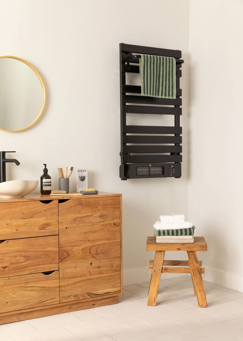 Instant heat electric towel dryer with 2000W blower for rapid bathroom warming.